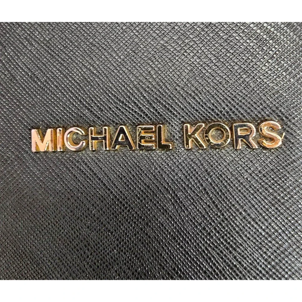 Michael Kors statement handle timeless